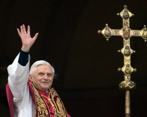 (FILES) A file picture taken on April 19, 2005 shows Germany's Joseph Ratzinger, the new Pope Benedict XVI, waving to the crowd from the window of St Peter's Basilica's main balcony after being elected the 265th pope of the Roman at the Vatican City.Benedict XVI announced on February 11, 2013 he will resign on February 28 because his age prevented him from carrying out his duties, an unprecedented move in the modern history of the Catholic Church. AFP PHOTO/PATRICK HERTZOG