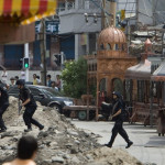 Armed police are seen in a mainly ethnic Uygur neighborhood in Urumqi, Xinjiang province, China, 08 July 2009.